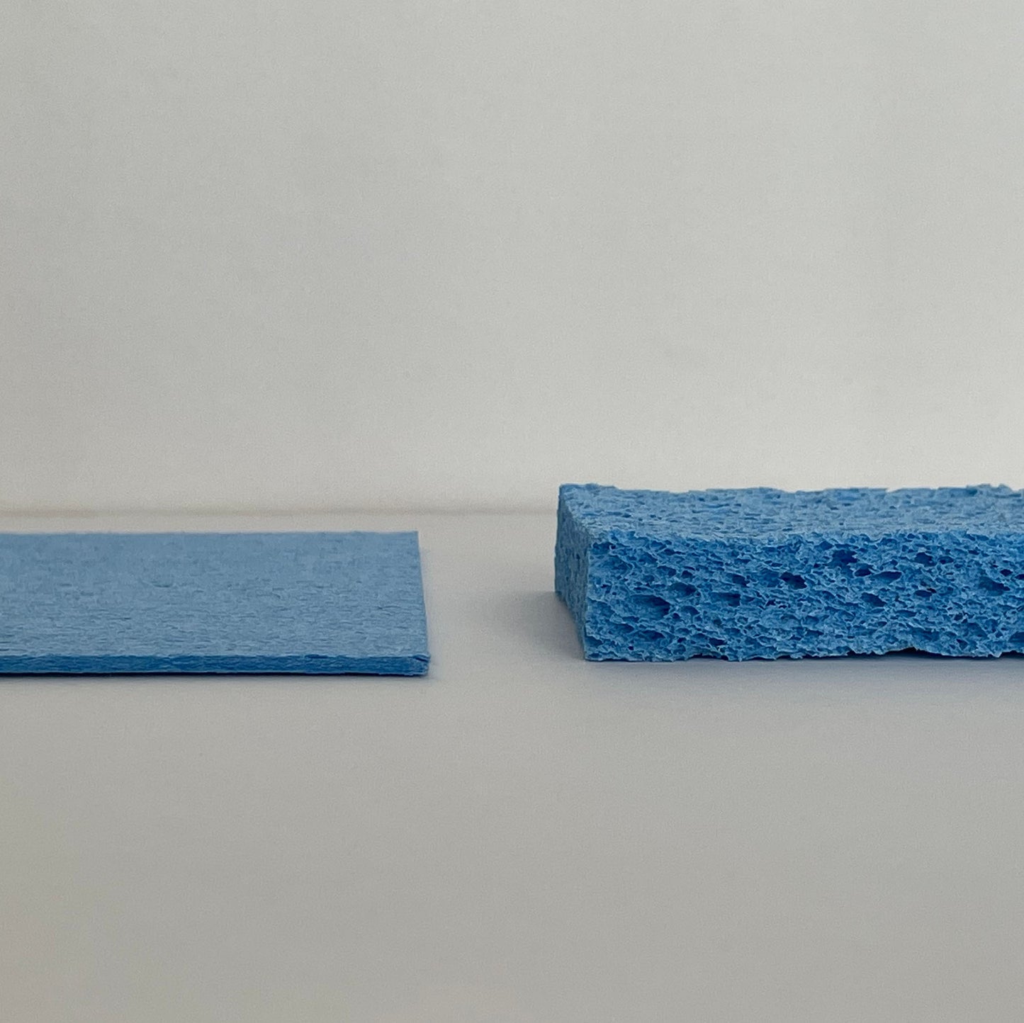 Cellulose Natural Cleaning Sponge - blue, flat and watered