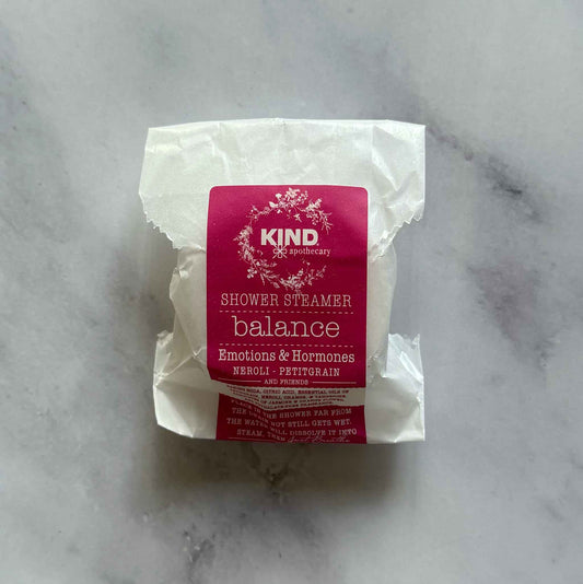 Balance Emotions and Hormones Shower Steamer on marble surface