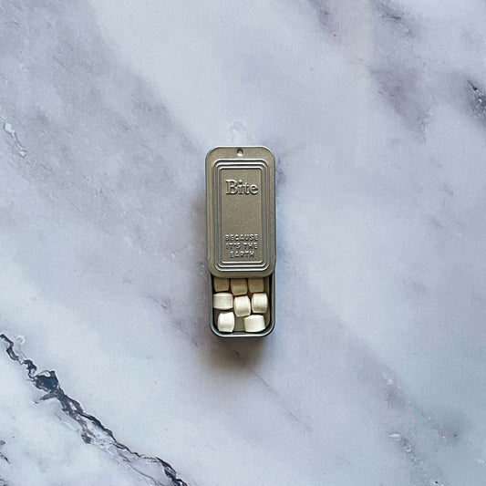 Travel Tin Half Open with Bits Inside