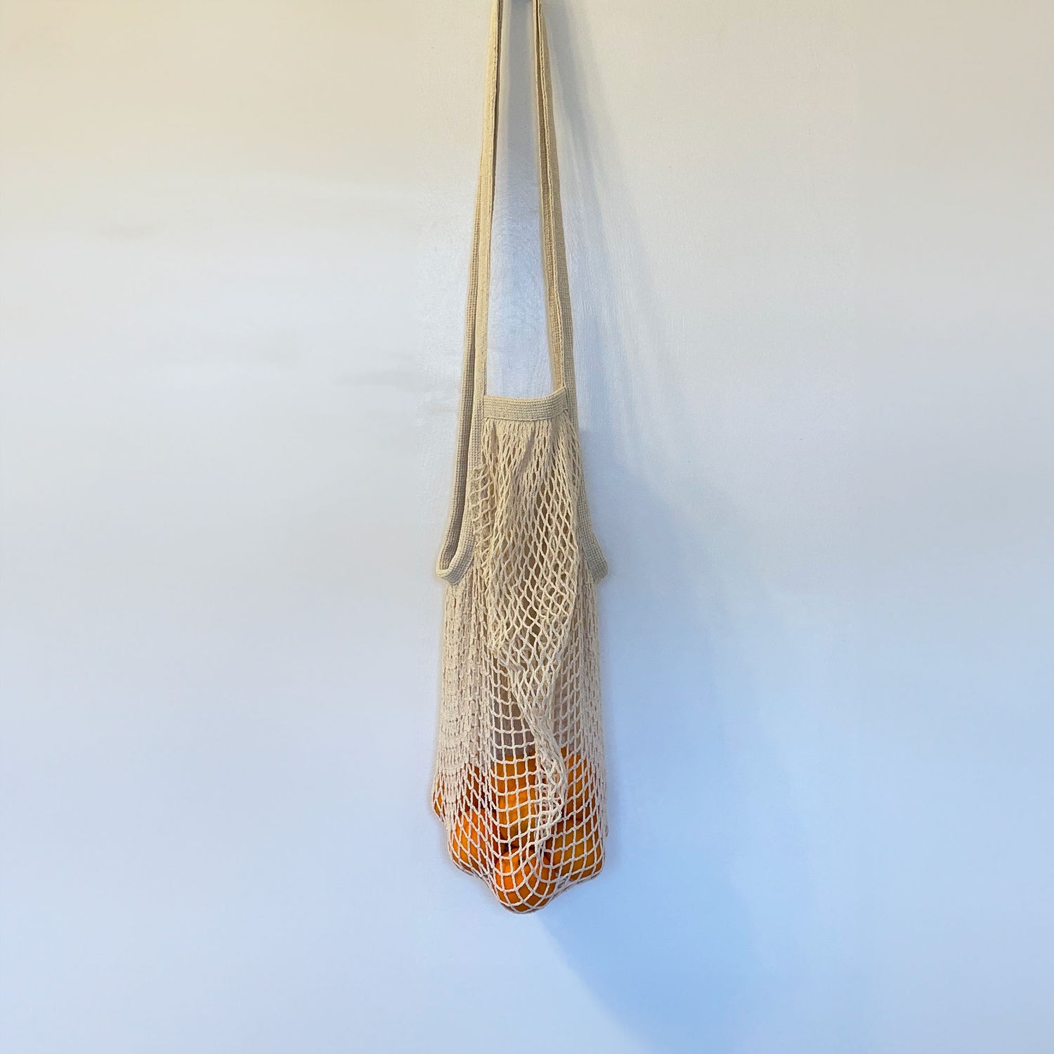 French Market Bag, Large, hanging with tangerines inside