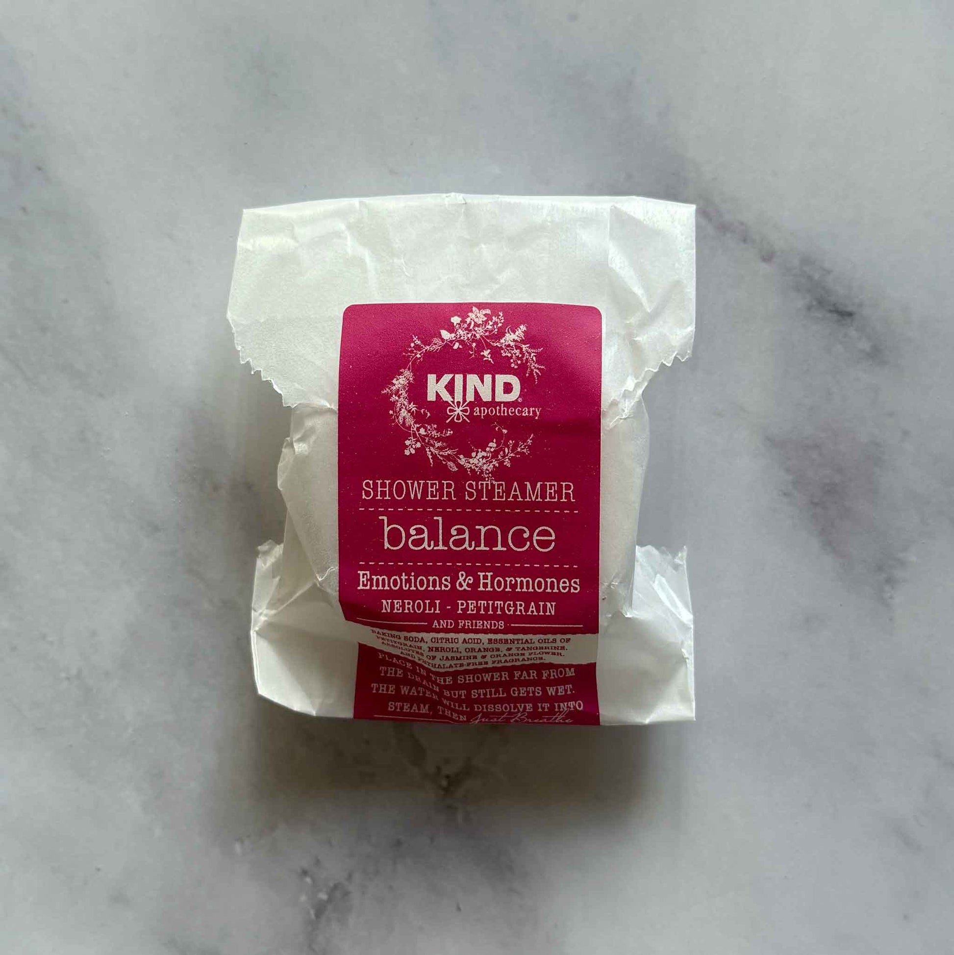 Balance Emotions and Hormones Shower Steamer on marble surface