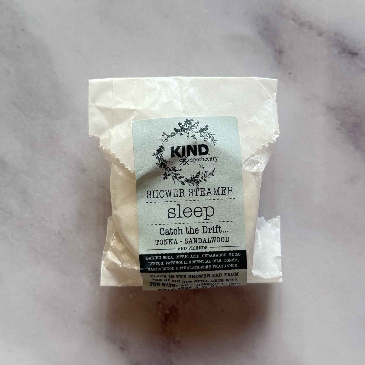 Sleep Shower Steamer on marble surface