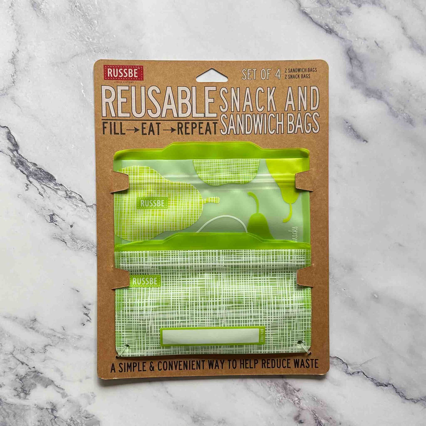 Pack of reusable snack and sandwich bags on a marble surface