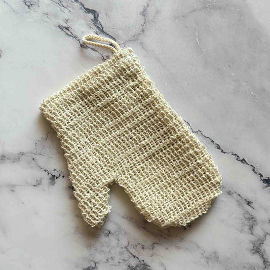 Sisal Exfoliating Shower Glove on marble surface