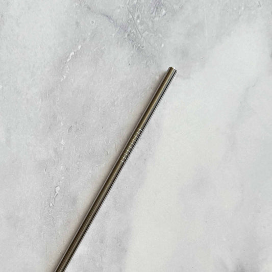 Reusable 8.5 Inch Straight Stainless Steel Straw on marble surface